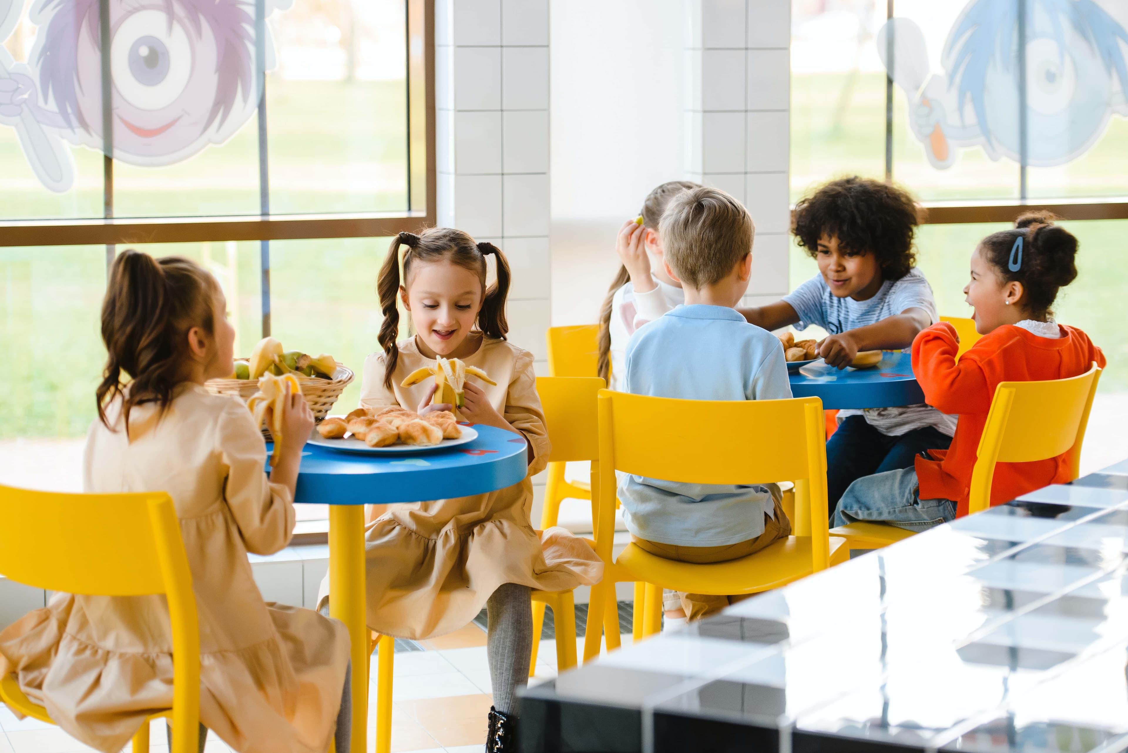 Children happily eating.